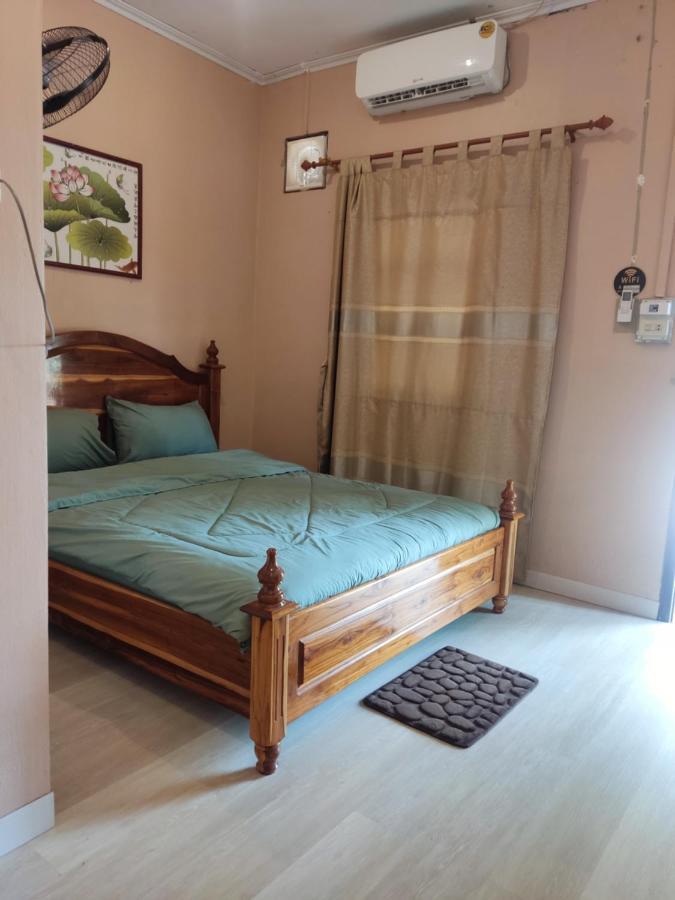 Erawan Guesthouse Паксе Экстерьер фото