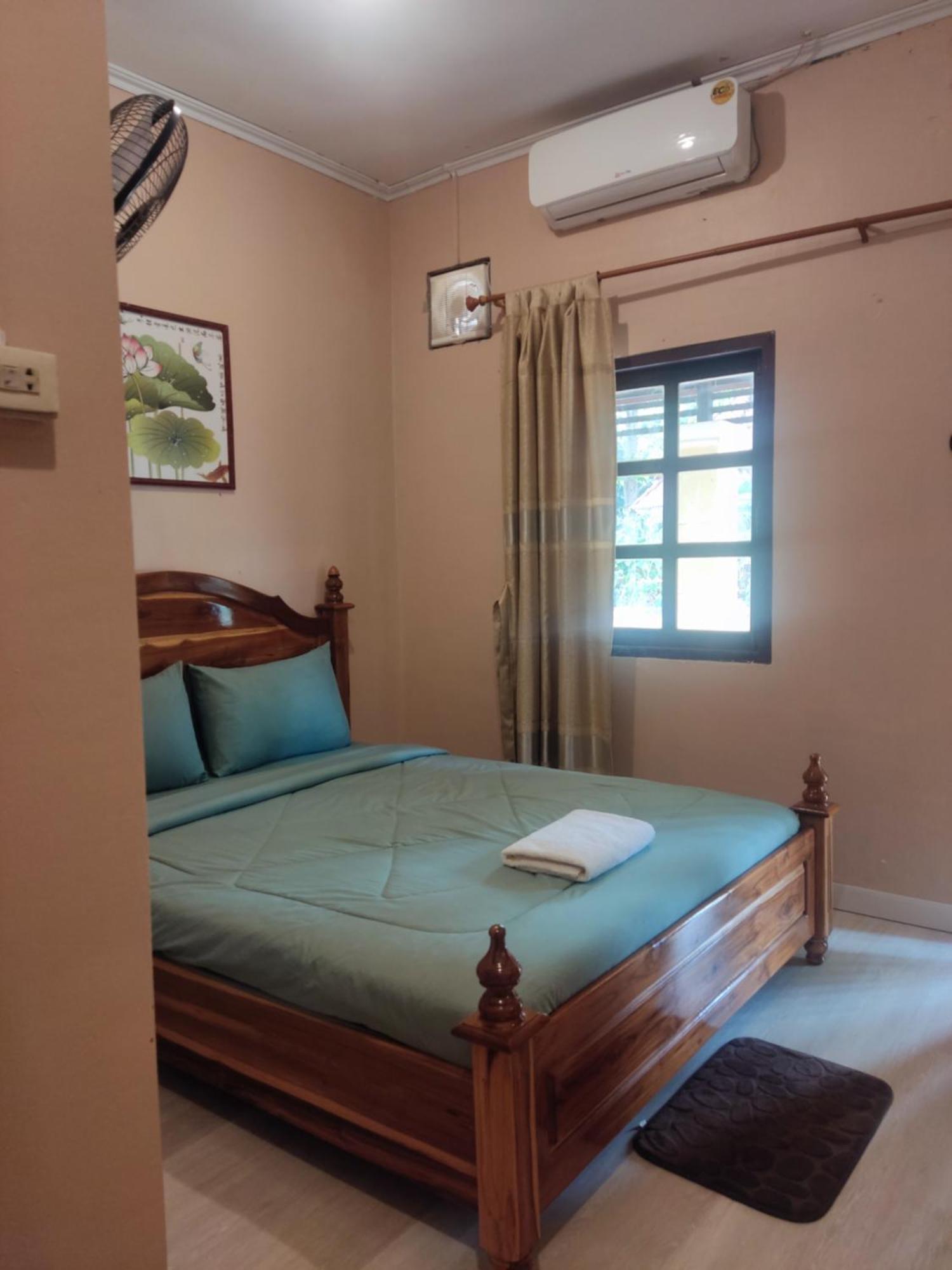 Erawan Guesthouse Паксе Экстерьер фото