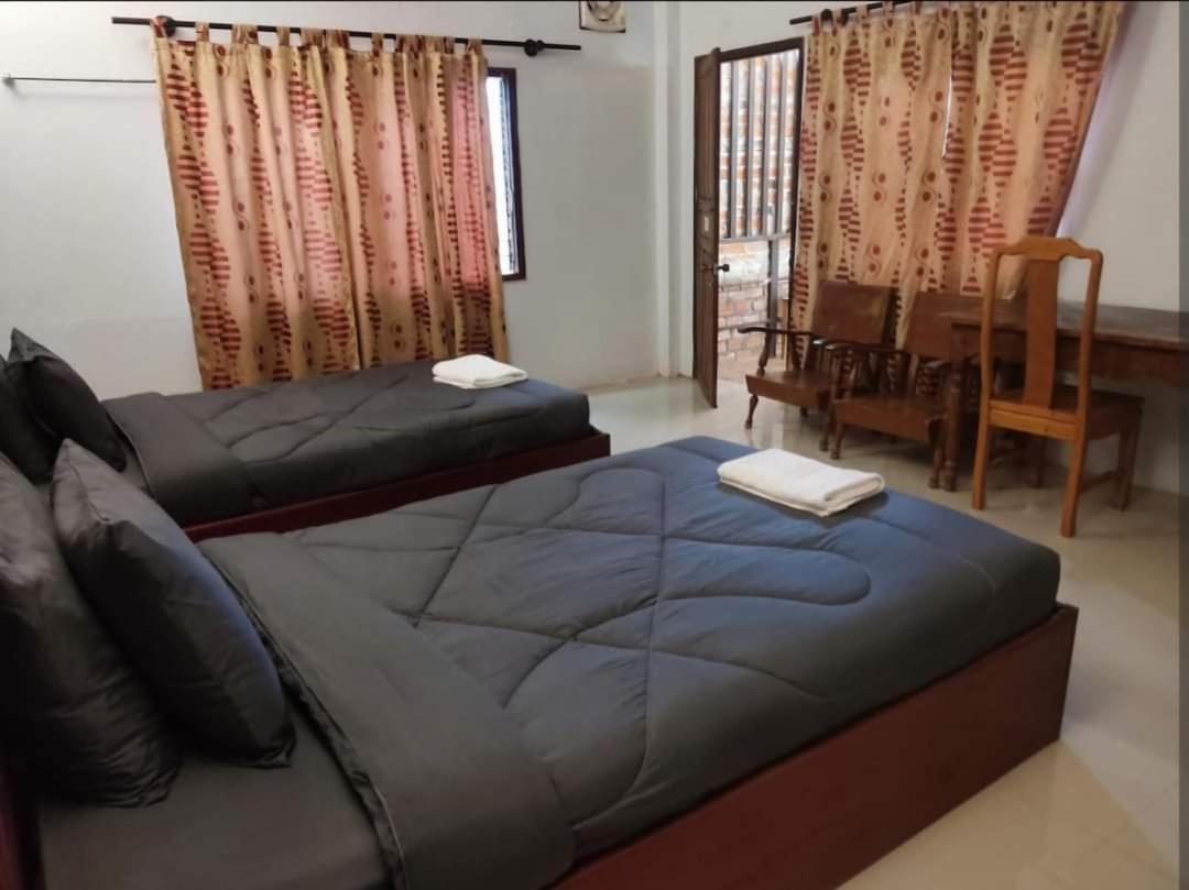 Erawan Guesthouse Паксе Экстерьер фото