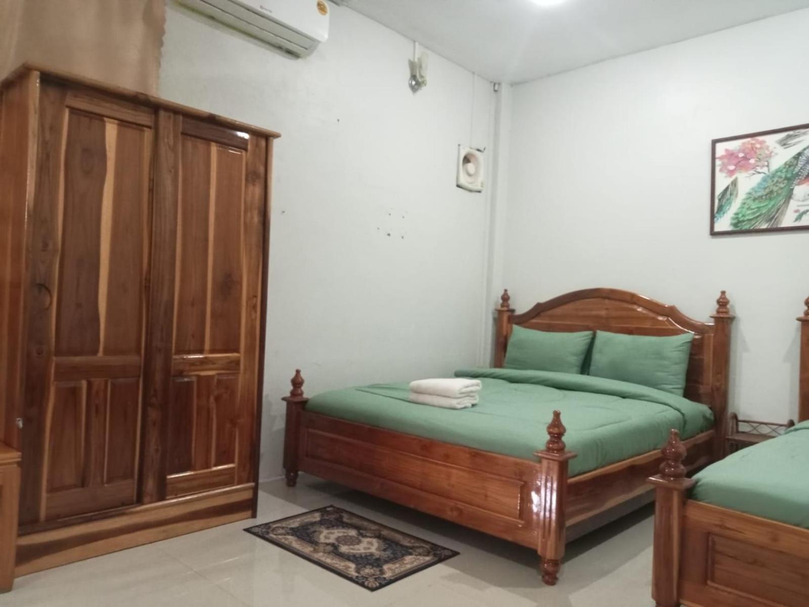 Erawan Guesthouse Паксе Экстерьер фото